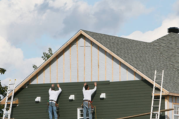 Professional Siding Contractor technician working in Stow, OH